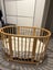 Stokke Oval Beech Wood Cot with Mattress Carousel 1