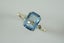 Magnificent ring with emerald cut Blue topaz in 9ct Carousel 2