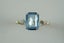 Magnificent ring with emerald cut Blue topaz in 9ct Carousel 3