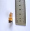 ESTATE MINIATURE FRENCH BOTTLE PENDANT WITH KAURI AMBER/GUM & GARNET INSIDE. Carousel 6