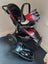 COSCO All terrain pram + baby capsule + base Carousel 1
