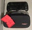 White Nintendo Switch OLED with screen protector, case, and handheld controller Carousel 3