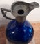 COBALT BLUE GLASS BODY WINE PITCHER C 1863-83 . PEWTER TOP. Carousel 6