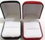 Pair of ring boxes - One Black with white lining, One red with white lining Carousel 1