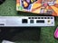 Silver PS2 slim, X2 controllers, boxed buzz game, X2 more games, cords & manual Carousel 9