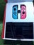 Nintendo switch OLED model, with box , accessories & Sonic hedgehog pro control Carousel 5
