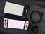 Nintendo Switch Oled + Case Carousel 1
