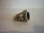 ORNATE SILVER & ONYX RING. Carousel 1