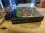Xbox with console with games Carousel 1