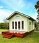 NATURALLY WARM COZY KITSET CABIN WITH LOFT Carousel 1