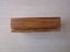A WOODEN BOX WITH MAORI CARVING ON LID, FELT-LINED INSIDE [LENGTH OF BOX: 175mm] Carousel 5
