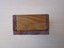 A WOODEN BOX WITH MAORI CARVING ON LID, FELT-LINED INSIDE [LENGTH OF BOX: 175mm] Carousel 6