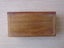 A WOODEN BOX WITH MAORI CARVING ON LID, FELT-LINED INSIDE [LENGTH OF BOX: 175mm] Carousel 7