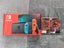 Nintendo Switch Neon Console + 2 Games Carousel 1