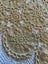 A lovely UNUSED hand crocheted ecru vintage Tablecloth Carousel 3