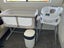 Baby stuff: cot, bath, nappy bin, rocker Carousel 1