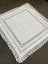 A beautiful very vintage white linen cloth with a deep hand crocheted edging Carousel 1