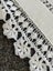 A beautiful very vintage white linen cloth with a deep hand crocheted edging Carousel 2