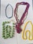 3 necklaces and Multiple beaded piece of Jewelry Carousel 1