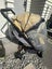 Edward's and Co Otto travel pram with a rain cover and a carryover bag Carousel 2