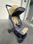 Edward's and Co Otto travel pram with a rain cover and a carryover bag Carousel 3