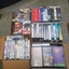 Boxes, boxes and boxes of VHS tapes. Assortment of genres from horrors to comedy Carousel 6