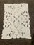 A lovely white worked linen Doily Carousel 1