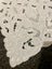A lovely white worked linen Doily Carousel 2