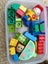 Tolo Toys Schoolboy & rattle & Lego Duplo in Tupperware Carousel 6