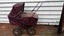 Vintage Cyclops child’s dolls pram Carousel 1