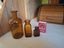 Bulk lot of Amber Vintage Medical bottles. Carousel 6