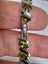 Fancy bracelet with faceted green stones Carousel 2