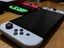 Switch OLED + Accessories + Mario Maker 2 Game Carousel 7
