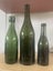 Old green bottle collection Carousel 1