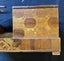 Old wooden cigarette box with bird on top Carousel 3