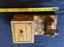 Old wooden cigarette box with bird on top Carousel 7