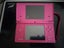 Pink Nintendo DSi + 4 games Carousel 1