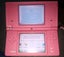 Pink Nintendo DSi + 4 games Carousel 2
