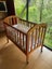 Touchwood cot includes Stokke bumper & waterproof sheets Carousel 3