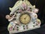 Vintage clock Porcelain Mantle Clock decorated with cherubs and floral motifs Carousel 4