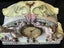 Vintage clock Porcelain Mantle Clock decorated with cherubs and floral motifs Carousel 13