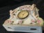 Vintage clock Porcelain Mantle Clock decorated with cherubs and floral motifs Carousel 16