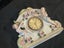 Vintage clock Porcelain Mantle Clock decorated with cherubs and floral motifs Carousel 18