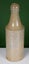 Attractive, Crudely made c1850s All Tan Stout / Porter Bottle Carousel 1