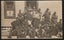 Postcard - WW1 NZ Soldiers outside a hut. Carousel 1