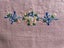 A lovely pink linen embroidered hand towel Carousel 1