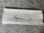 A lovely white huckaback linen embroidered hand towel Carousel 3