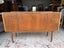 A 'Greaves & Thomas' Mid Century Modern Rosewood Sideboard or Home Bar cabinet Carousel 13