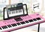 61 Key Electronic Keyboard Piano with Microphone Adjustable Stand Carousel 2