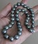 Top Quality 9.1-11.9mm Round Tahitian Sea Peacock Green Pearl Necklace Carousel 1
